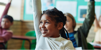 Child in school raising hand planning for college