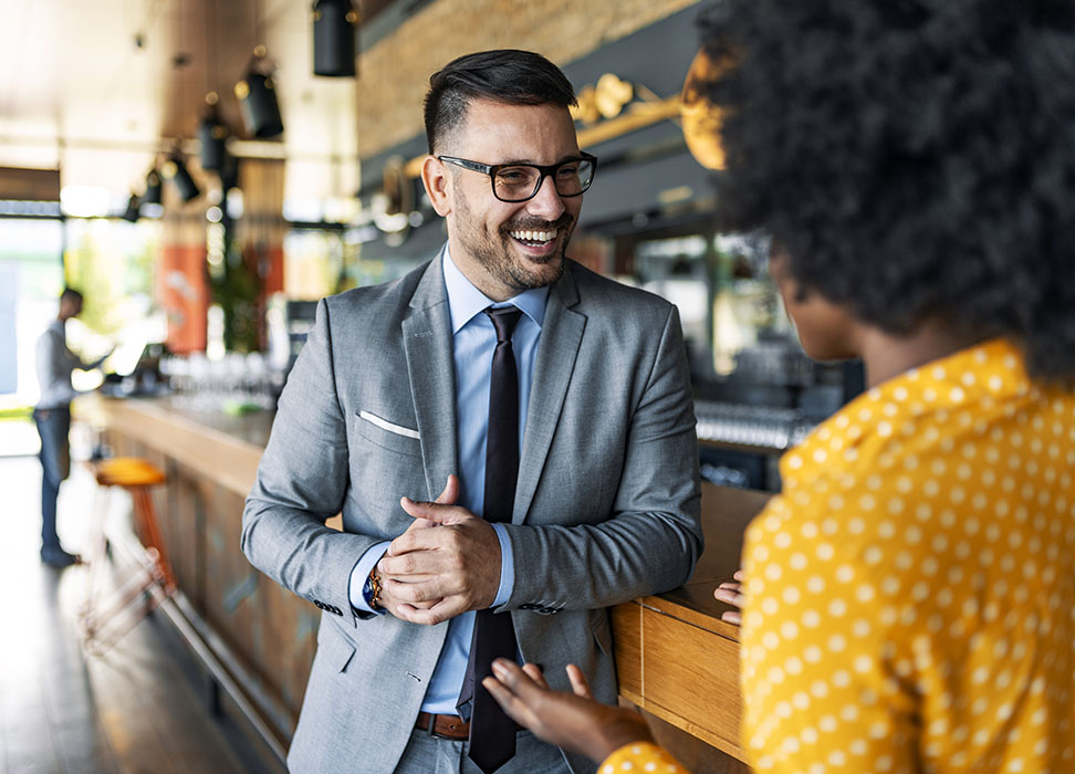 business man talking to business woman