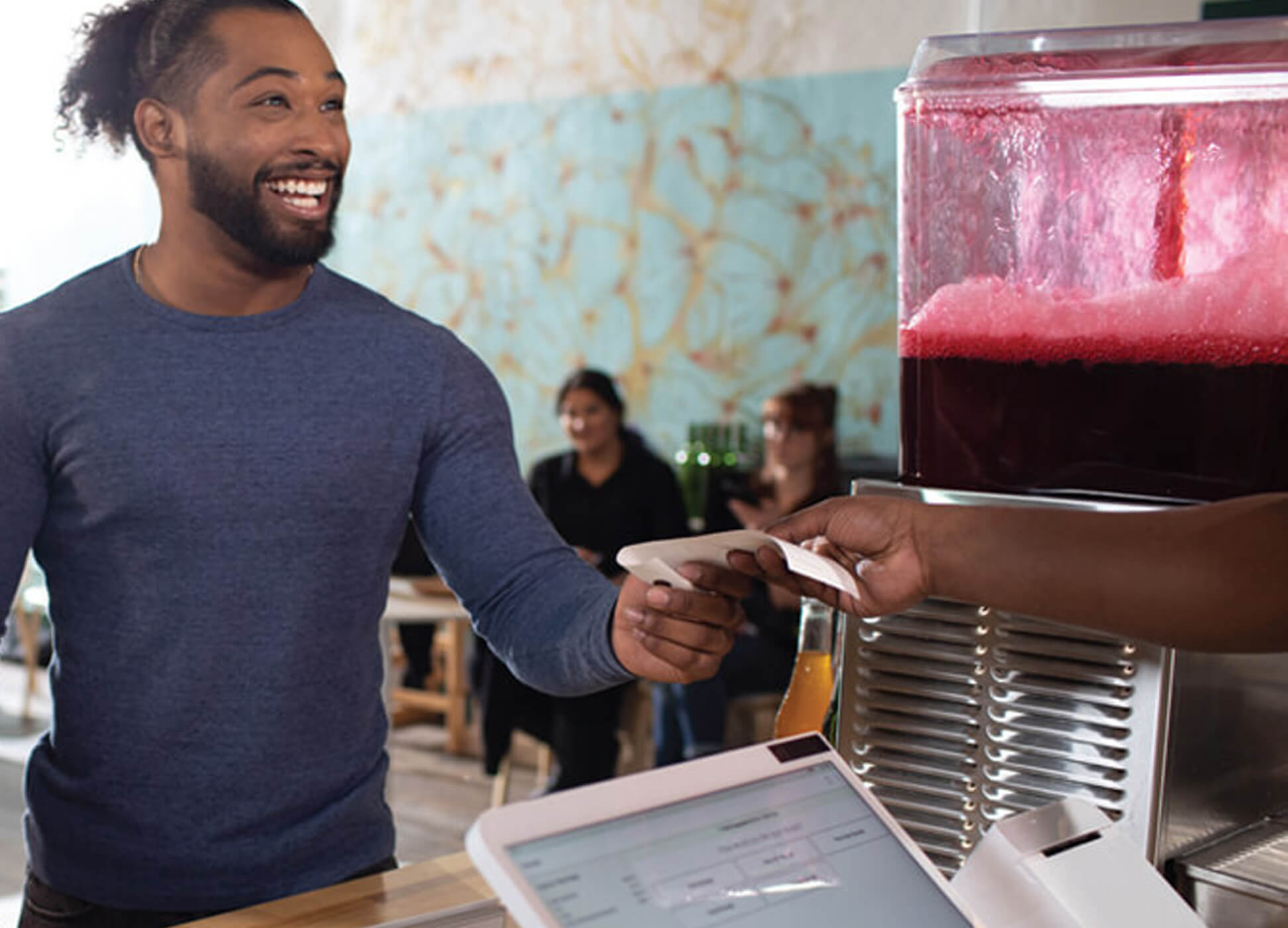 man receiving receipt after payment at restaurant